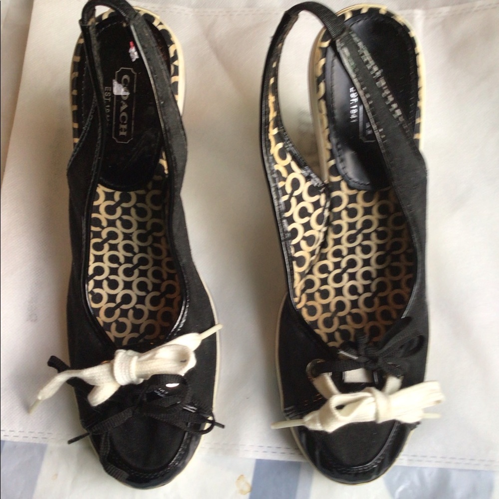 Coach sling backBlack and white fabric body with leather accent SZ 9.5